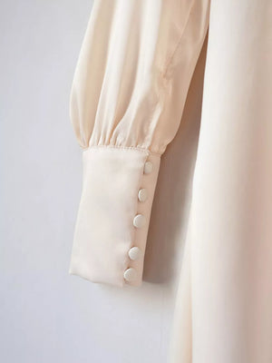 midi dress in Eggshell with v-neck and lantern sleeve