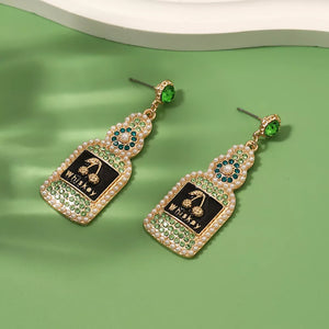 Synthetic Pearl, 18K Gold-Plated, Resin, Zinc alloy, Rhinestone Care instruction earrings in black with straight silhouette