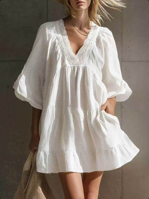mini dress in white featuring lace trim and A-line fit