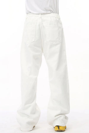 White wide-leg denim trousers with elastic waist and back pockets
