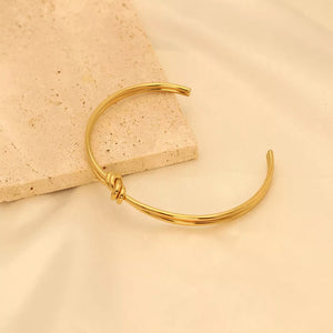 gold with bracelet with knot detail 11