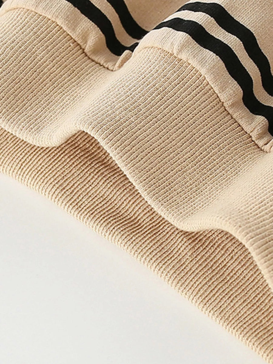 Tan cotton crew neck sweatshirt with black stripes and ribbed details.