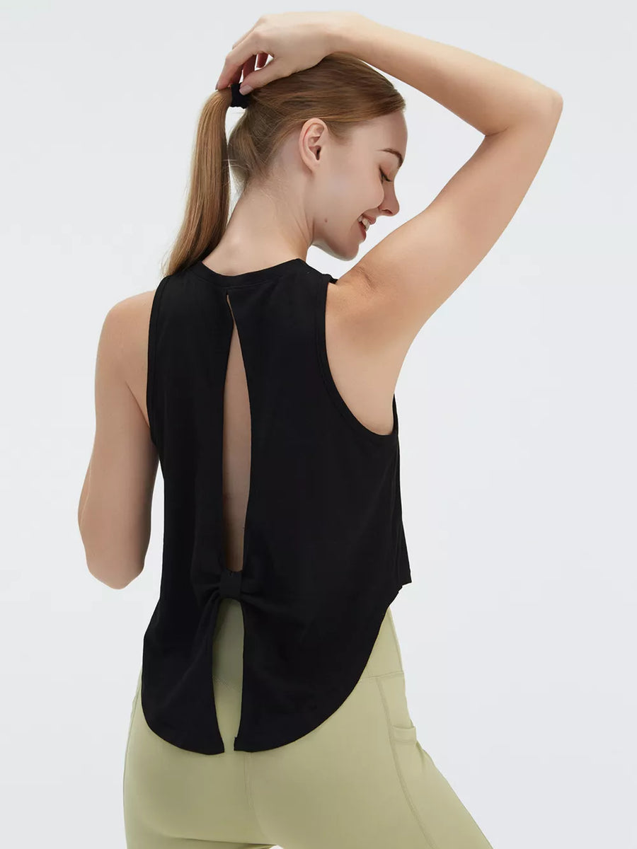 Black sleeveless tank top with open back and tie detail