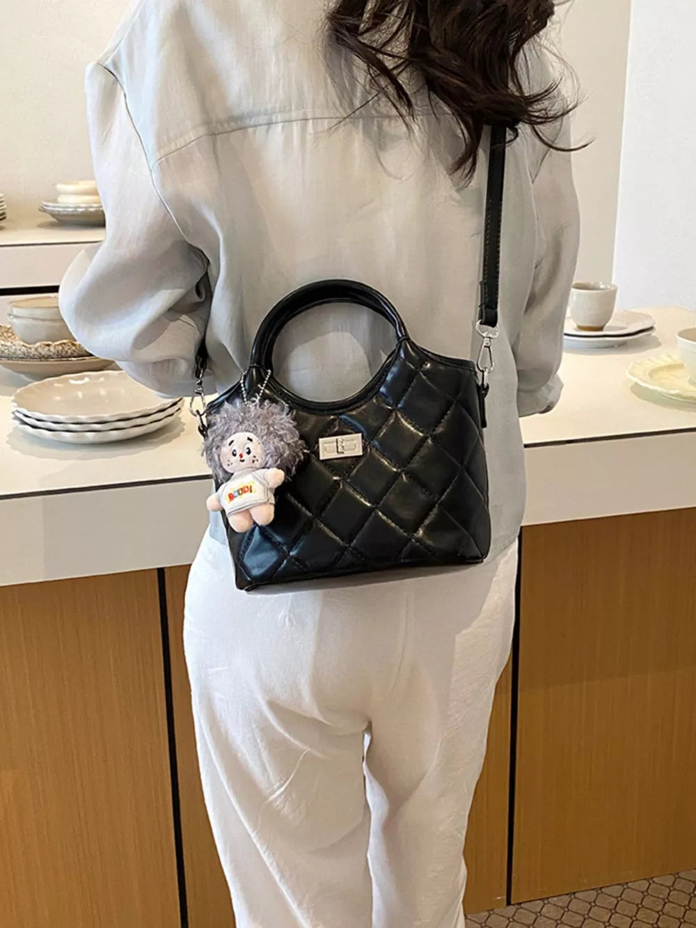 crossbody bag featuring quilted in Black with PU Leather Imported Size &amp texture