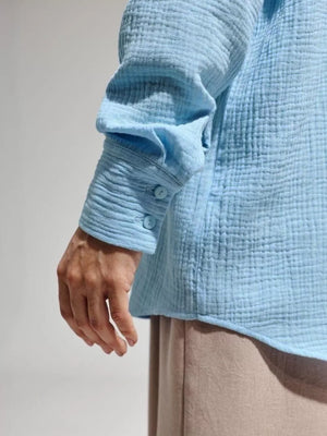 white button-down shirt with gauze texture and long sleeve