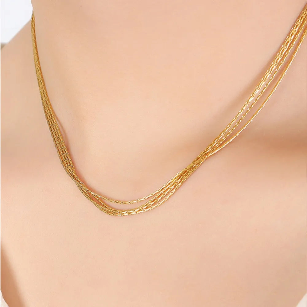 Gold multi-strand collar necklace with delicate chains