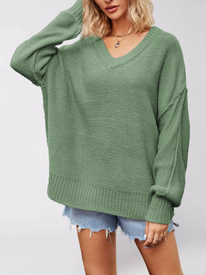 Green v-neck sweater with hip-length and pullover