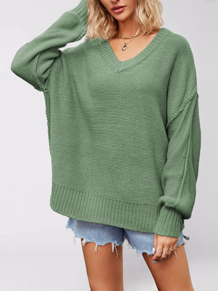 Green v-neck sweater with hip-length and pullover