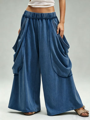 cargo pants in denim blue featuring pocketed and oversized fit
