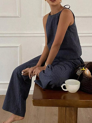 Blue striped sleeveless top and wide-leg pants set with tie shoulder detail.