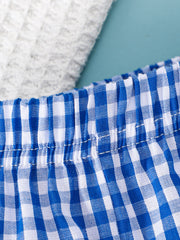 Baby blue gingham bow shorts with elastic waistband detail