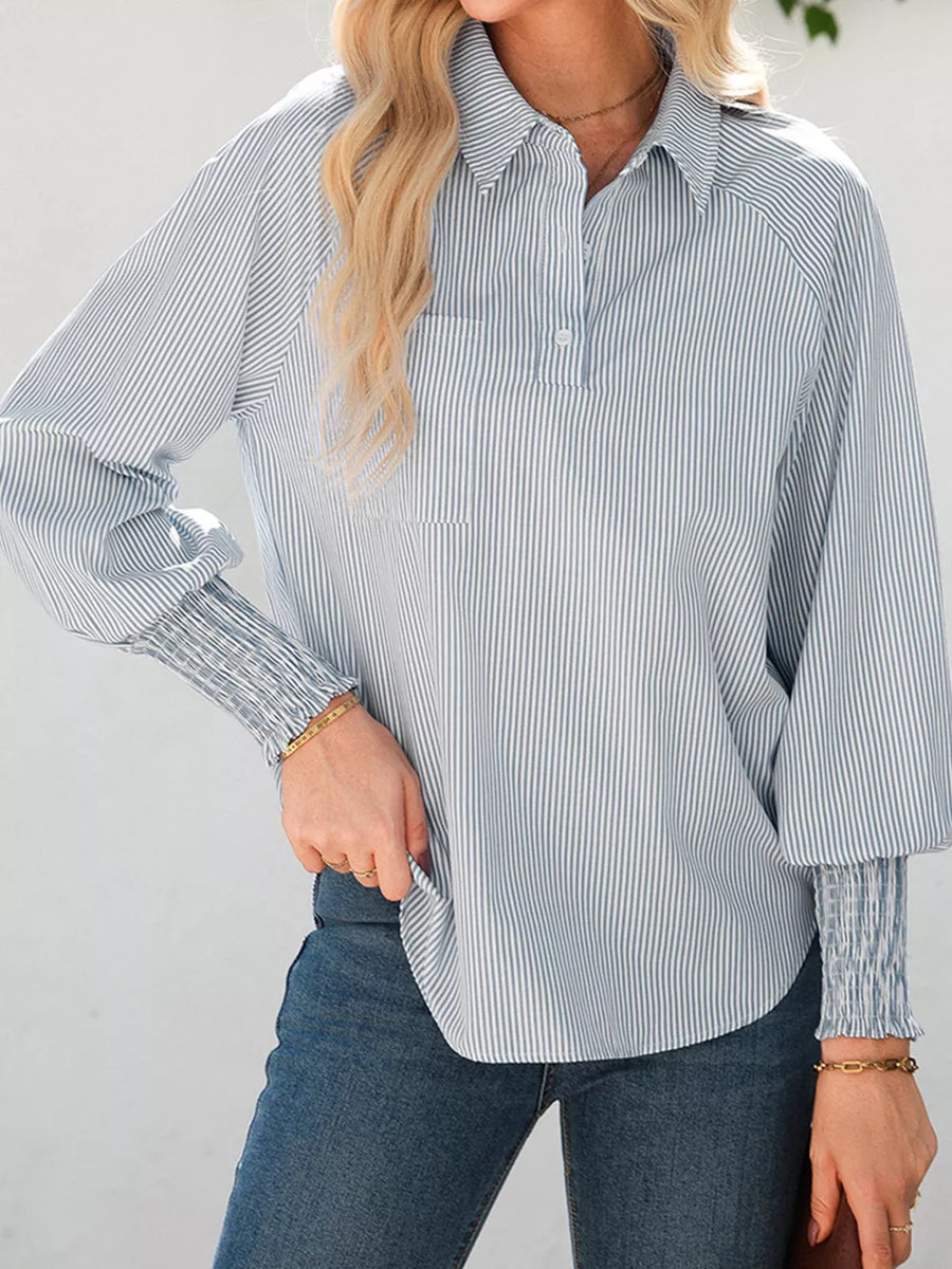 Striped collared shirt with balloon sleeves and smocked cuffs.