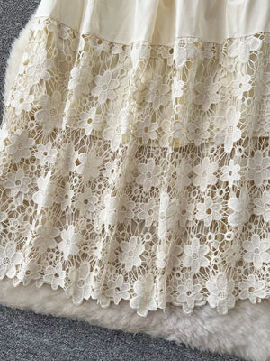 Tiered lace skirt in apricot with floral detail and elastic waist
