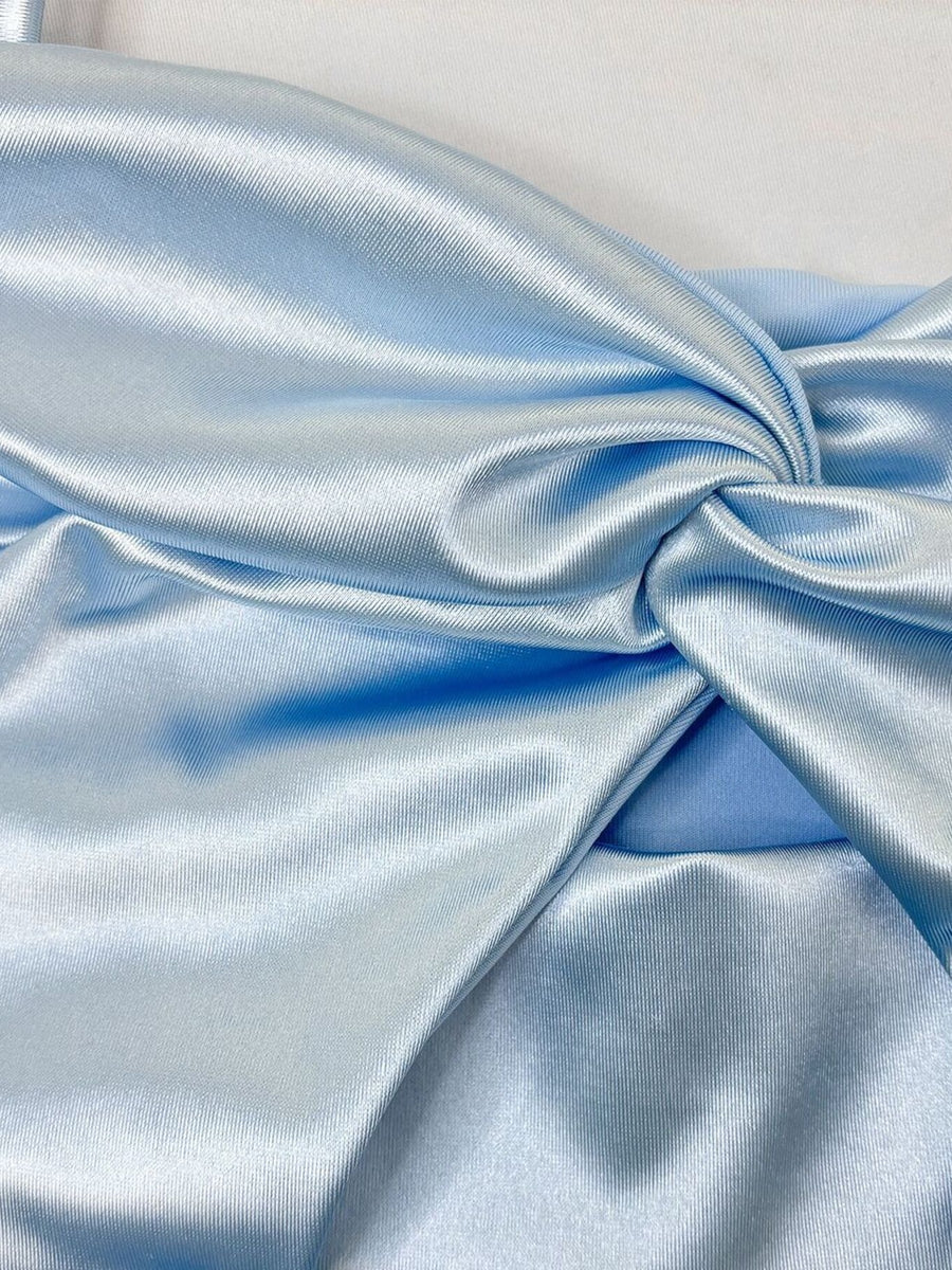 Light blue satin top with a twisted knot detail