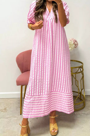 Pink striped midi dress with V-neck and short puff sleeves.