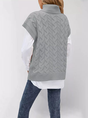 sweater vest featuring cable knit in Black with 100% Acrylic Care instructions: Machine wash cold texture