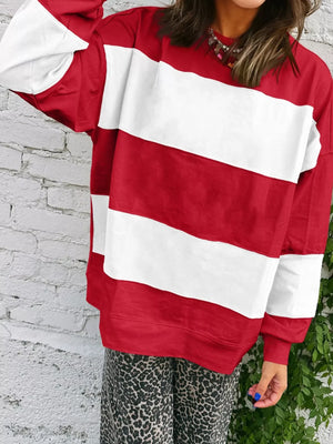 Drop shoulder sweatshirt in scarlet and white horizontal stripes with a relaxed fit.