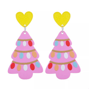 Festive Christmas tree dangle earrings in pink with colorful lights and yellow heart tops.