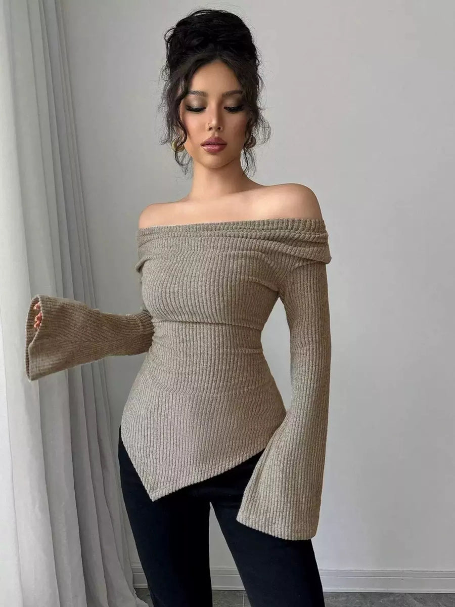 Asymmetrical ribbed cowl neck top in khaki with bell sleeves and a draped hem.