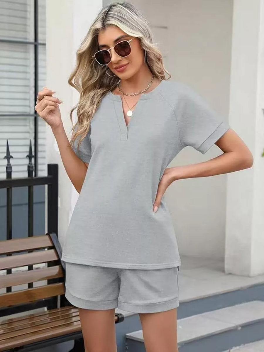 Light gray relaxed two-piece set with v-neck top and shorts
