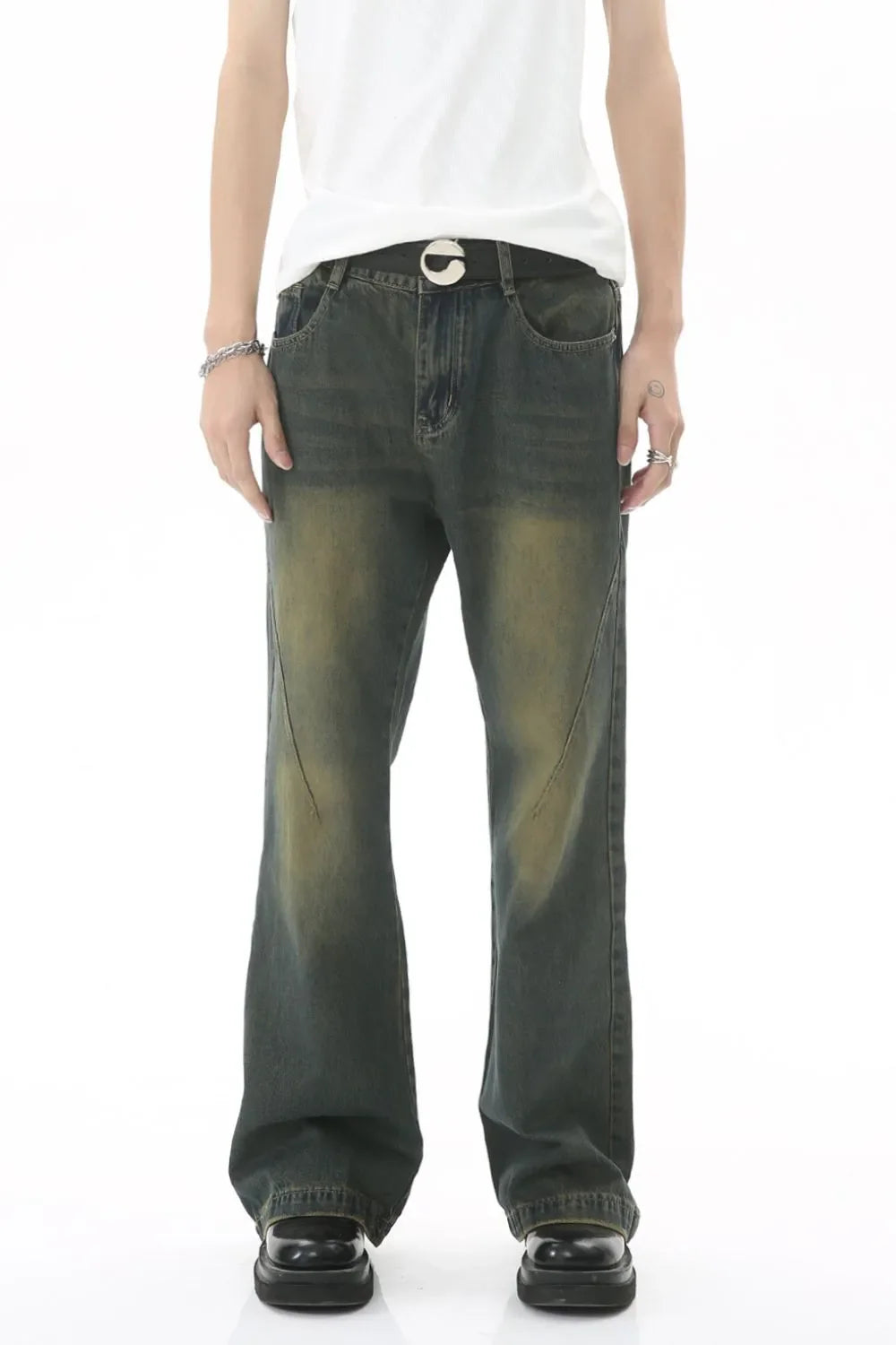 Faded wash flare denim jeans in dark with subtle whiskering and seam detail.
