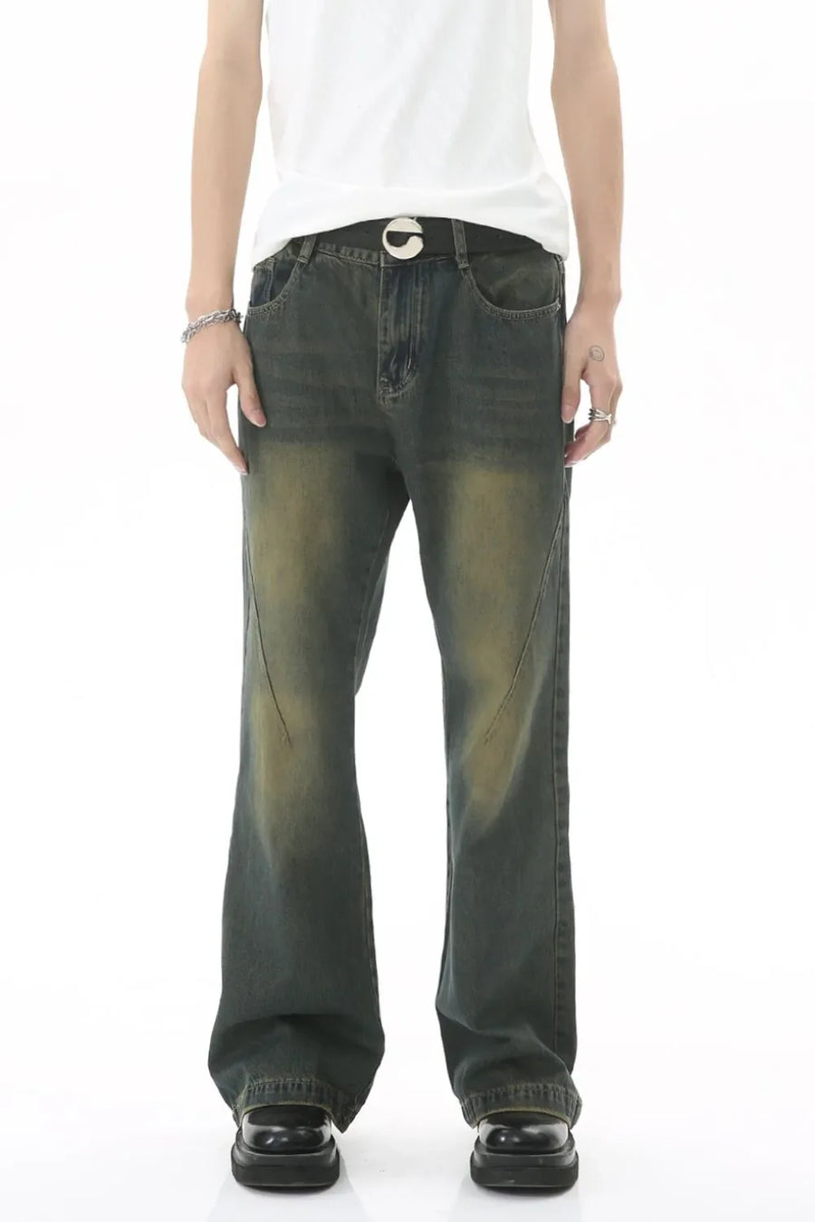 Faded wash flare denim jeans in dark with subtle whiskering and seam detail.