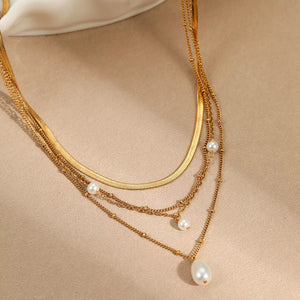 Synthetic Pearl,18K Gold-Plated,Stainless Steel Care instructions: Avoid wearing necklace in Gold with layered silhouette