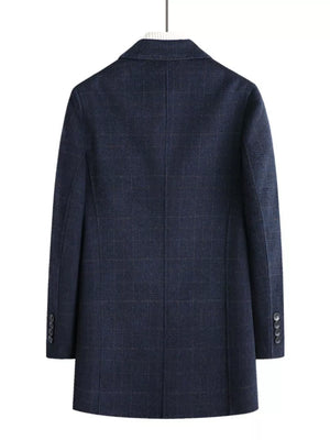 Men's navy plaid wool blend overcoat with buttoned cuffs.