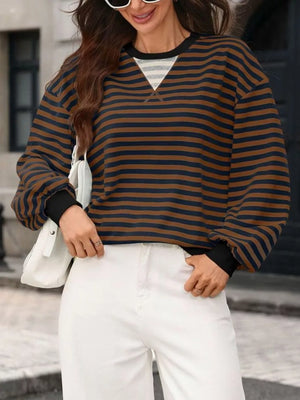 65% Rayon 30% Polyester 5% Spandex Care instructions: Machine wash cold sweatshirt in Blue Red with relaxed silhouette