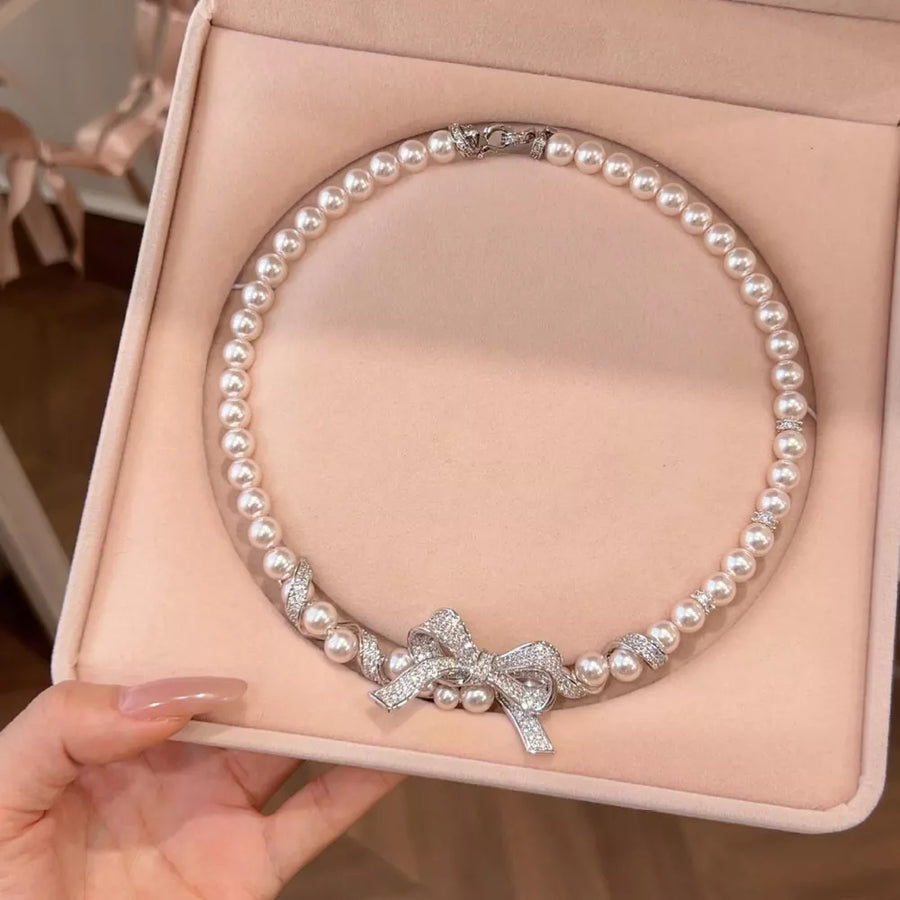 Synthetic Pearl,Alloy,Zircon Care instructions: Avoid wearing during exercise, a necklace in Silver with fitted silhouette