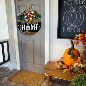 orange decorative hanger featuring hanging loop and plaid, graphic print