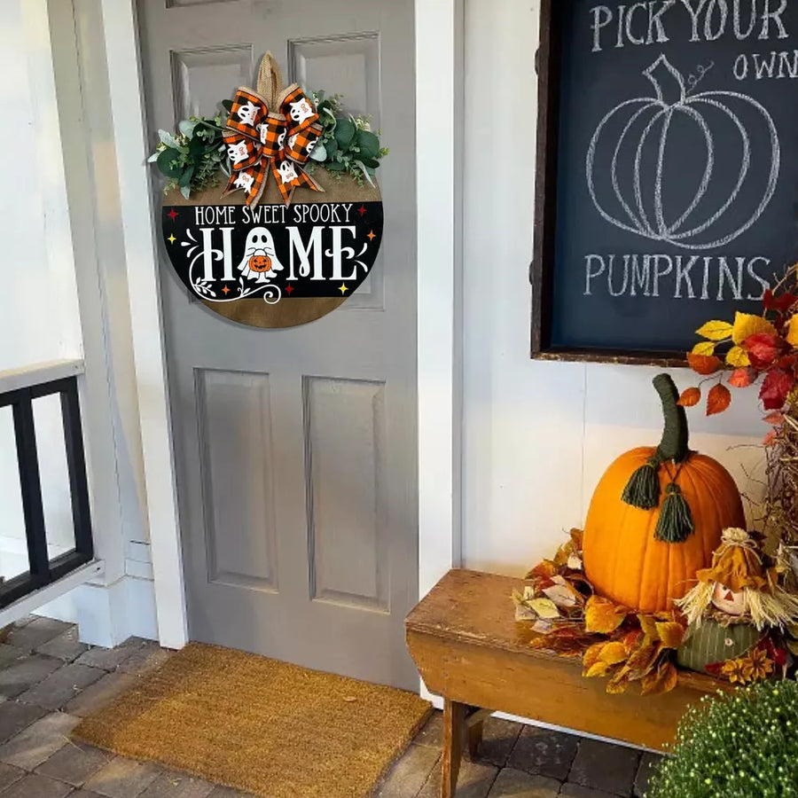 orange decorative hanger featuring hanging loop and plaid, graphic print