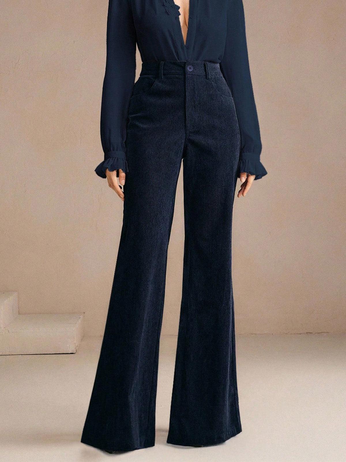flare pants in navy blue featuring pocketed and flared fit