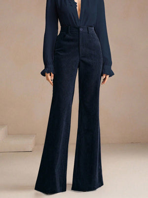 flare pants in navy blue featuring pocketed and flared fit