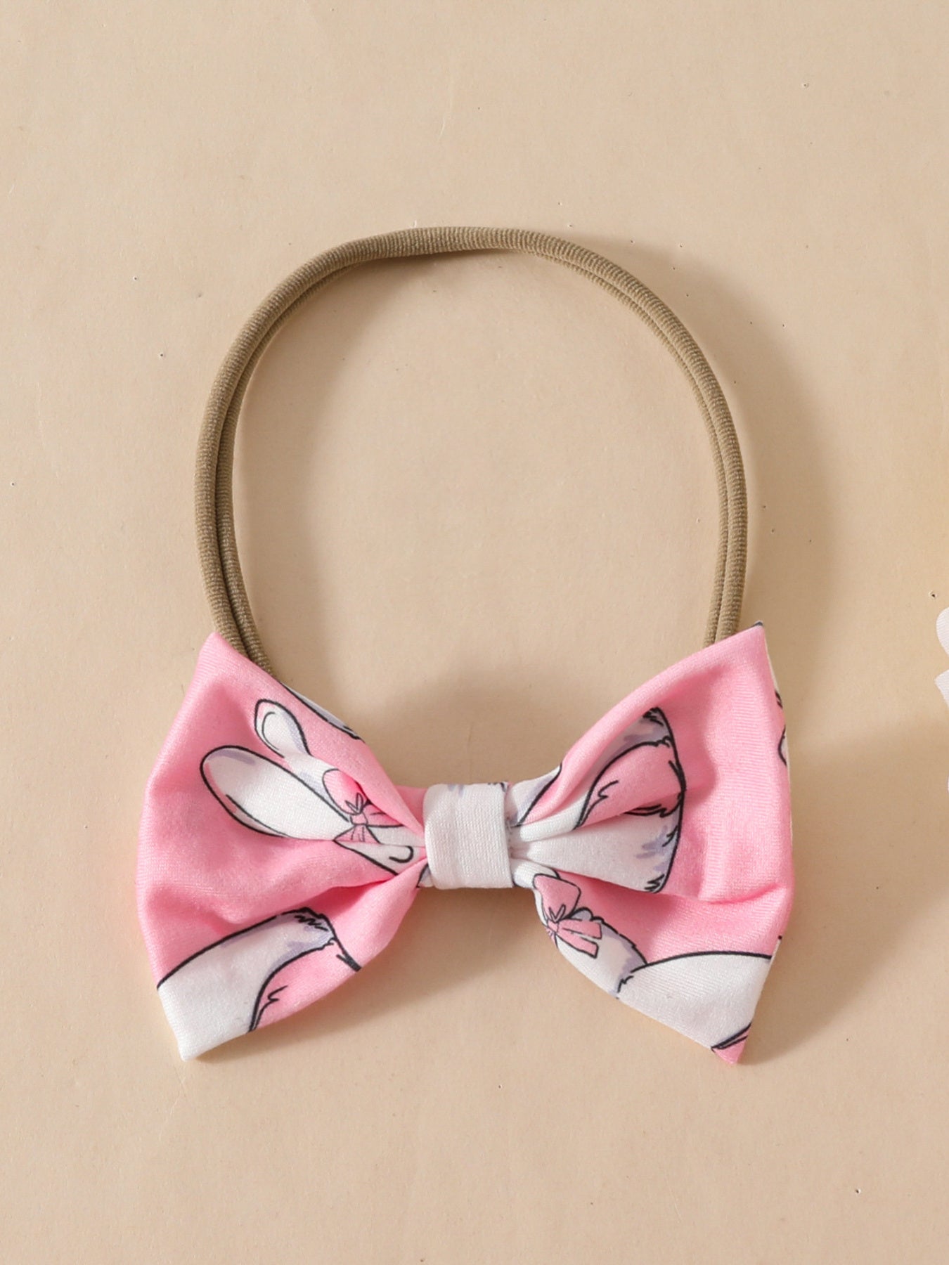 Pink bow headband with bunny print and elastic band