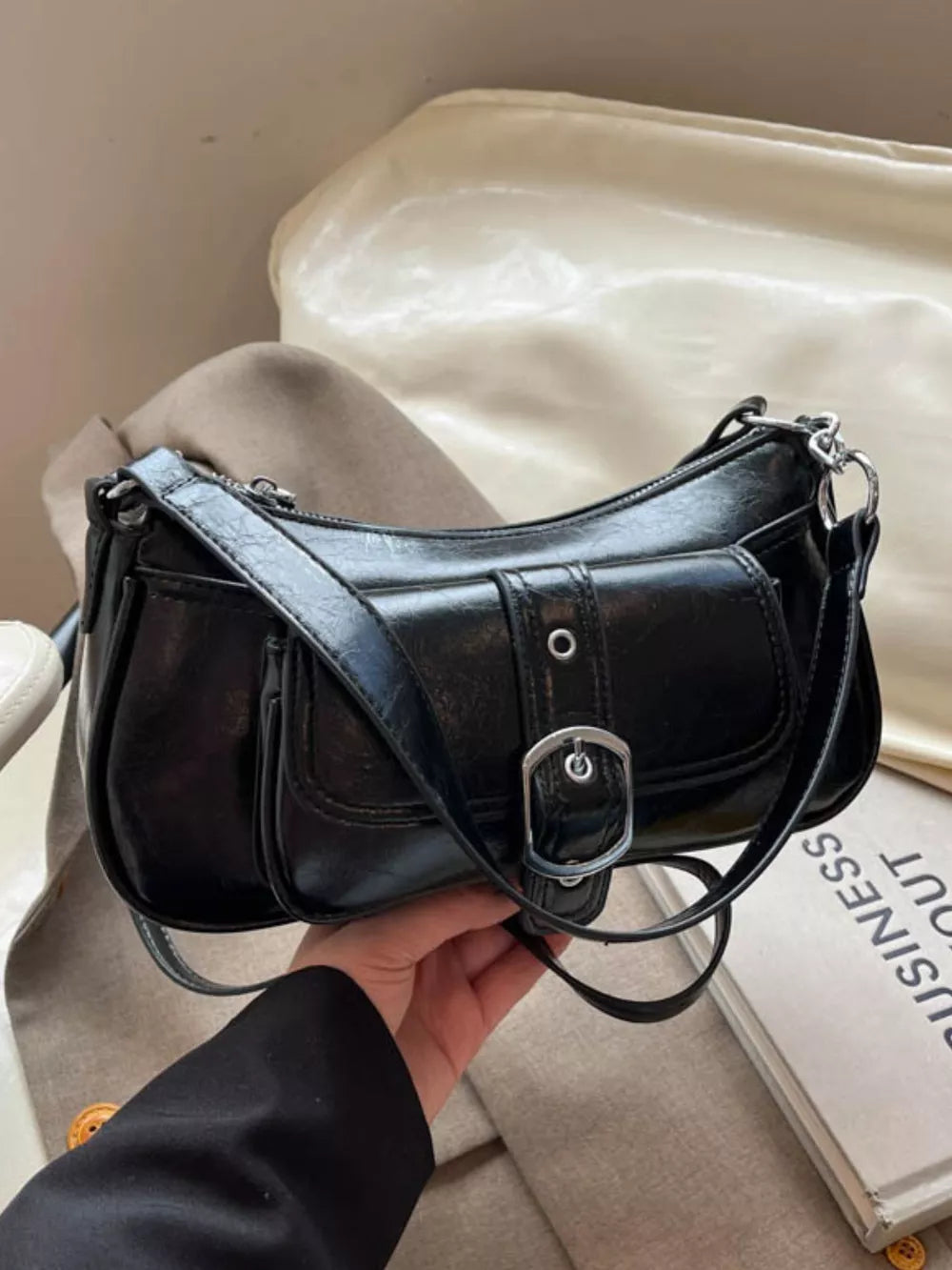 black with crossbody bag with buckle detail