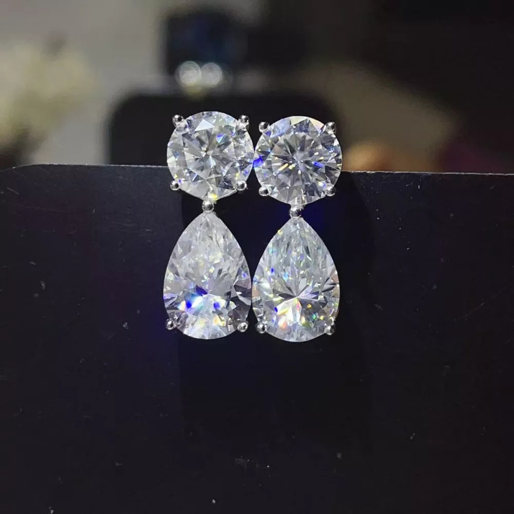 earrings in clear featuring faceted stones and drop fit