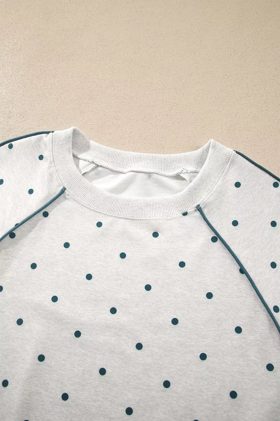 pullover sweater in Light Gray with polka dot and contrast stitching