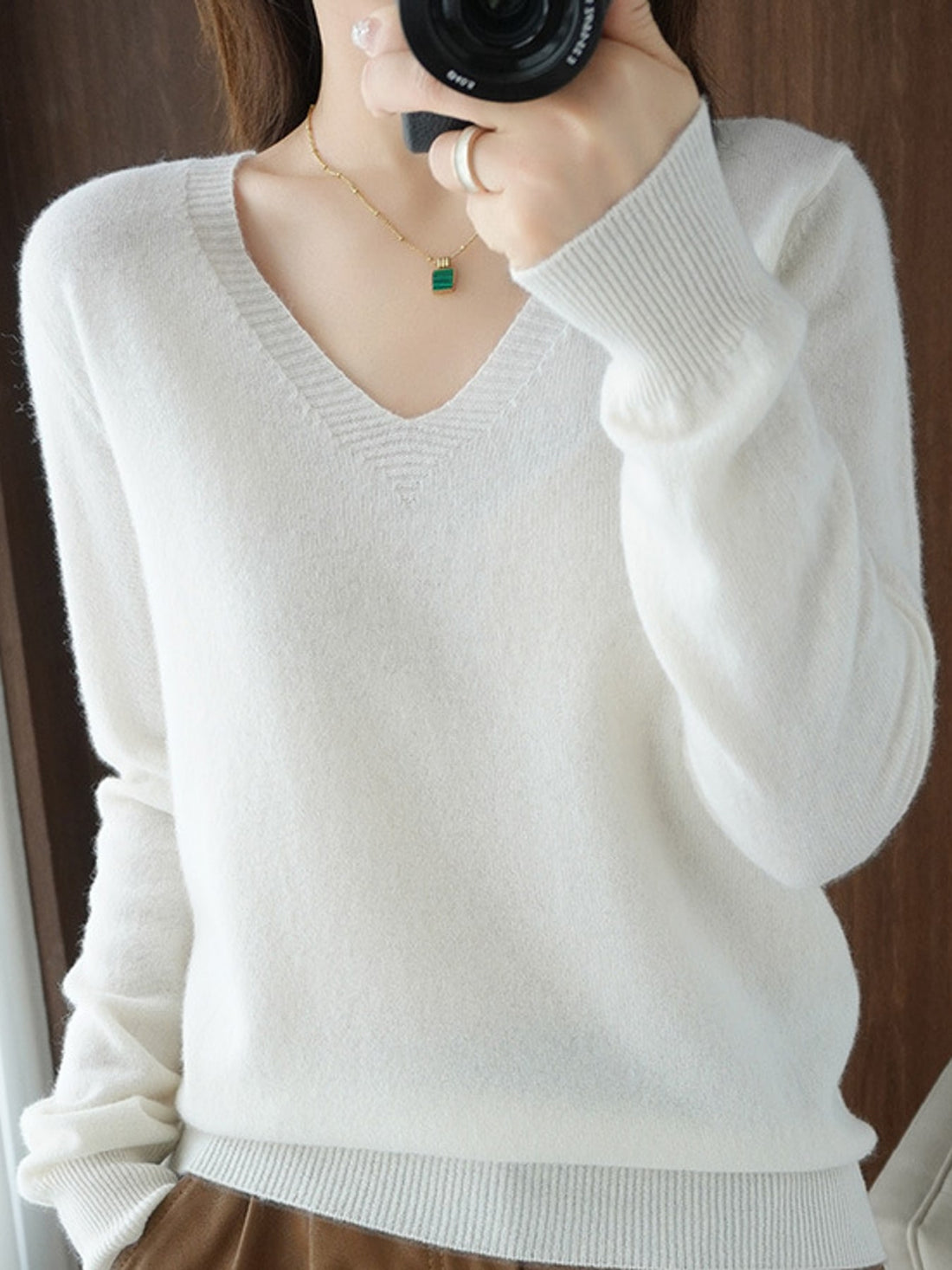 v-neck sweater in ivory featuring lightweight and relaxed fit