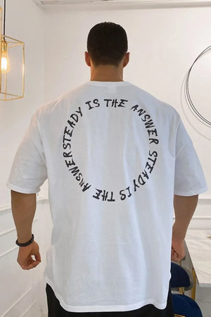 Men's oversized white t-shirt with black circular text graphic on back