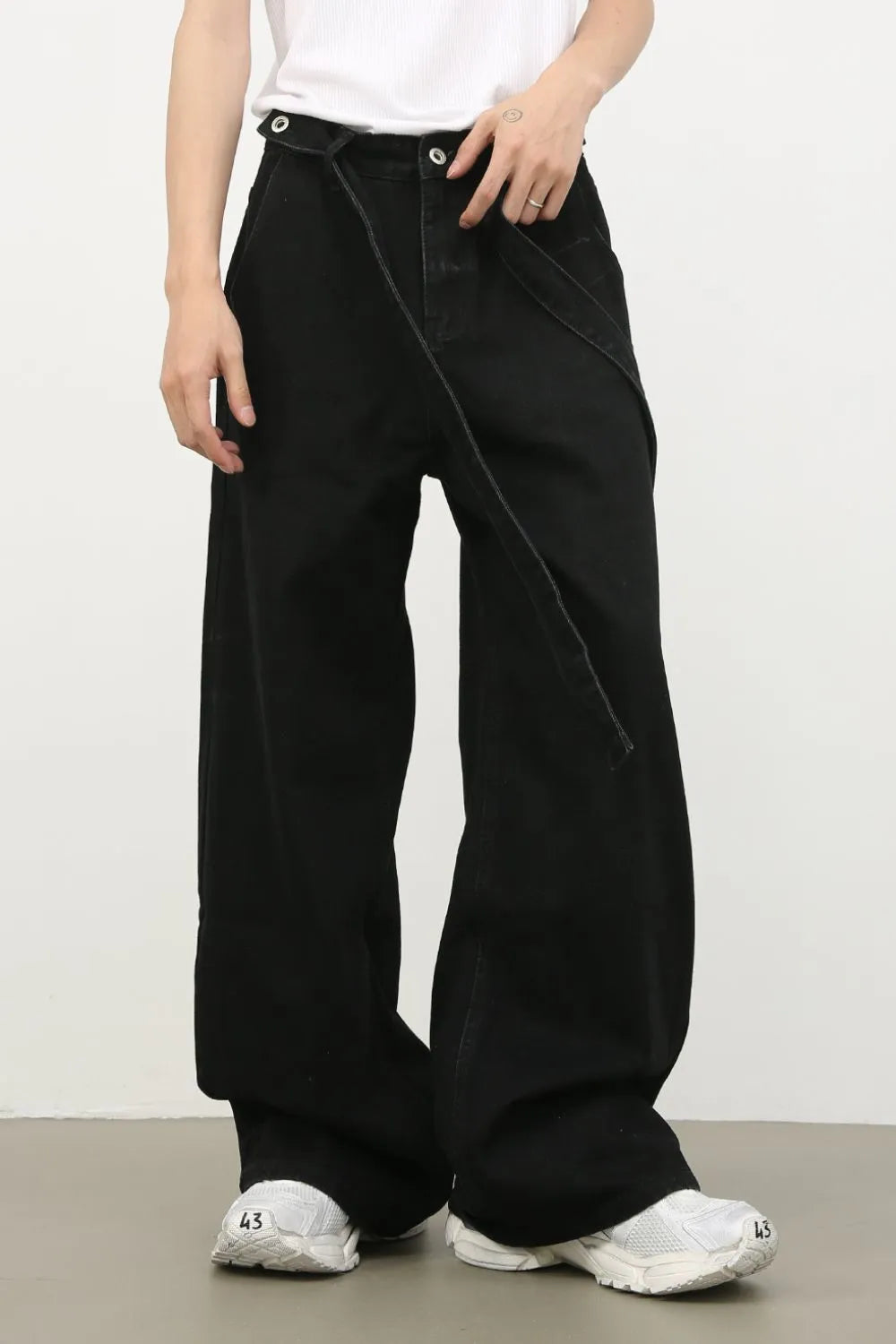 Black denim exaggerated wide leg pants with tie detail