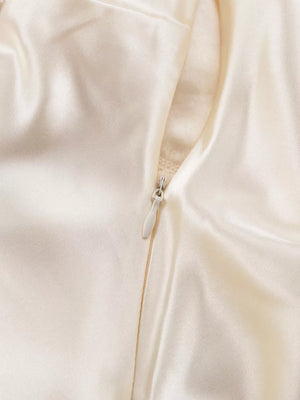 Cream satin dress with side zipper detail