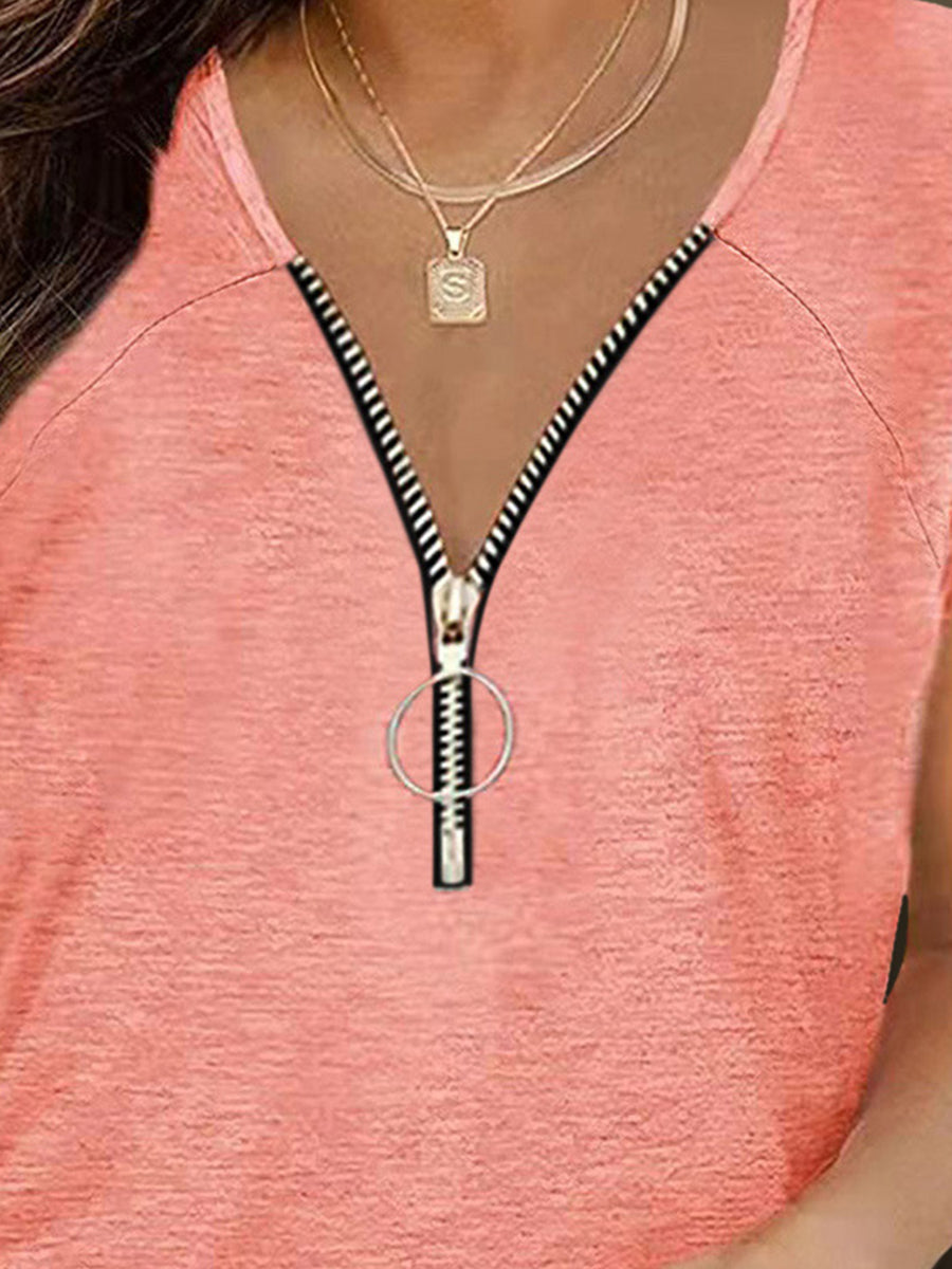 Zip-front ruched tee in Burnt Coral with cap sleeves and a ring zipper pull.