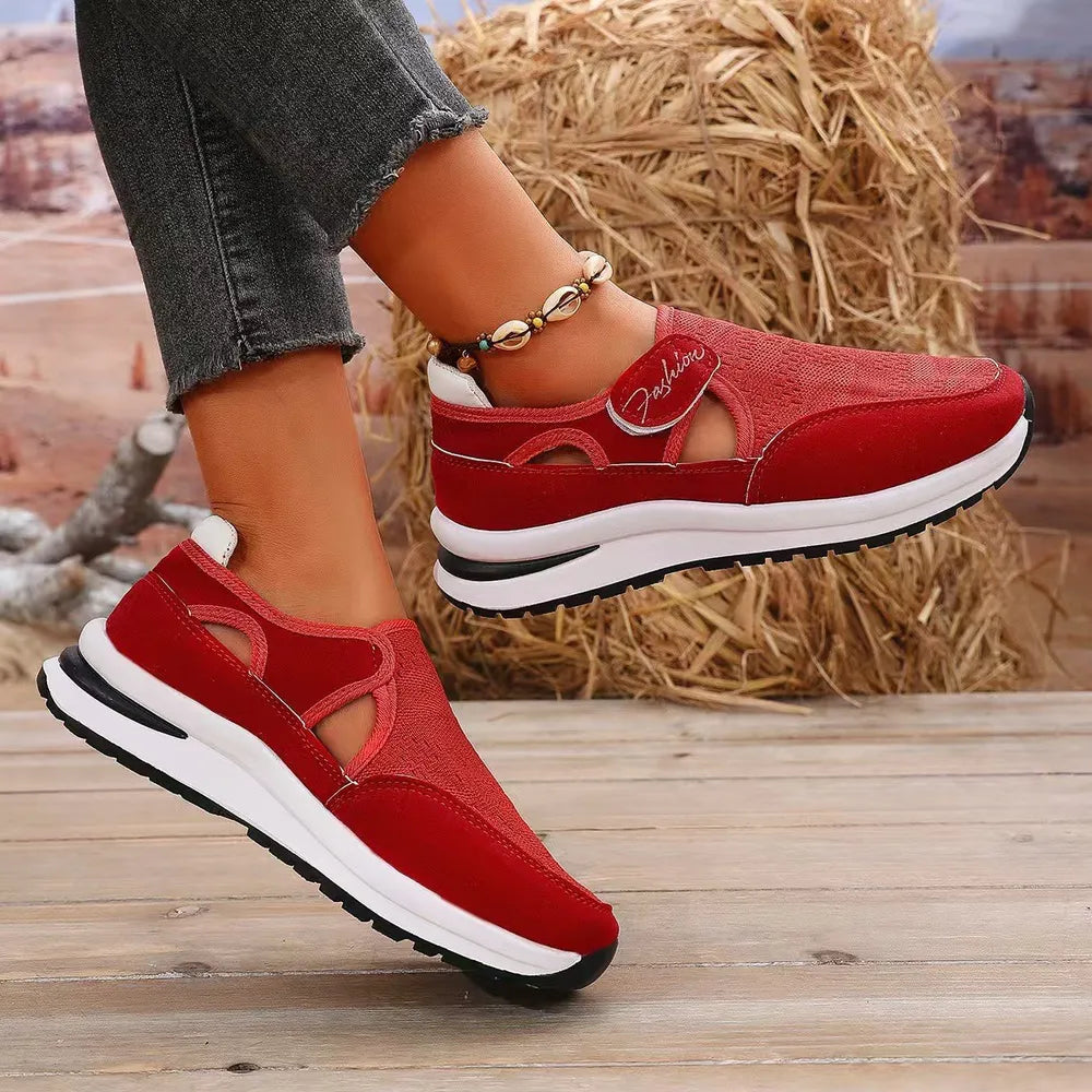 Red cutout mesh platform slip-on sneakers with white soles and "Fashion" detail.