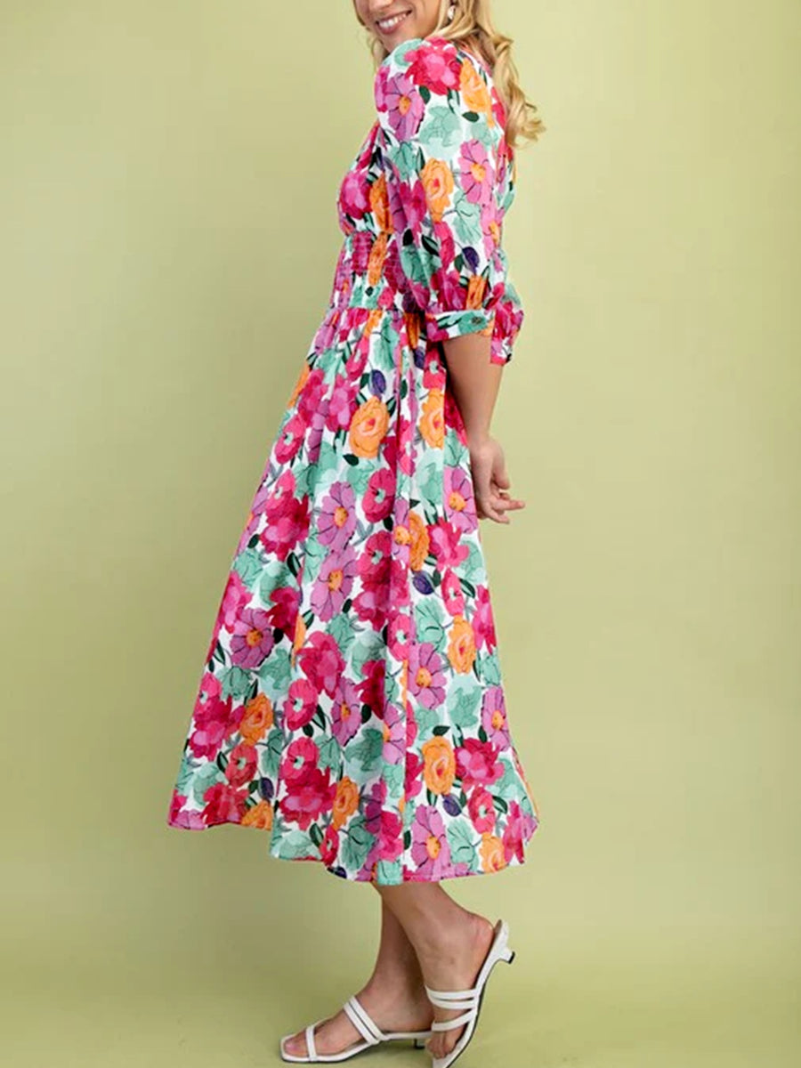 Floral V-neck zip midi dress with smocked waist and puff sleeves in a cotton blend.