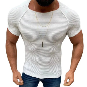 Ivory ribbed raglan tee with short sleeves and a sculptural fit.