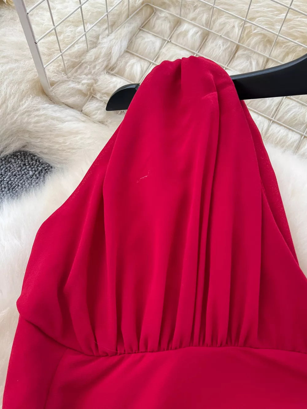 Red one-shoulder maternity maxi dress with ruched bodice detail.