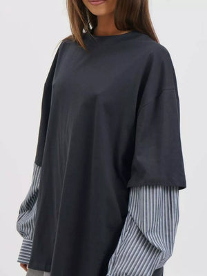 95% viscose, 5% elastane Care instructions: Machine wash cold t-shirt in slate gray with oversized silhouette