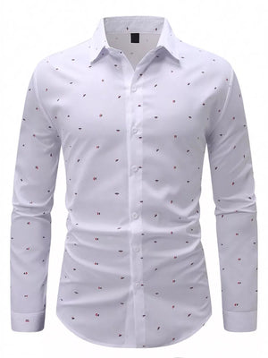 White button-up shirt featuring button cuffs and abstract print