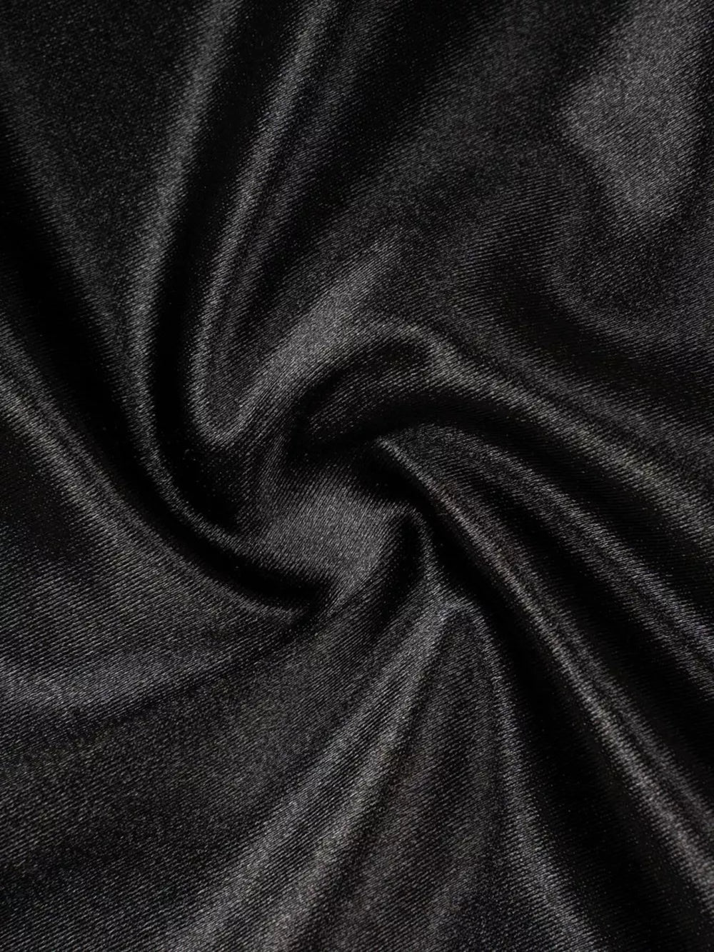 Black satin skirt fabric with a lustrous sheen and soft drape.